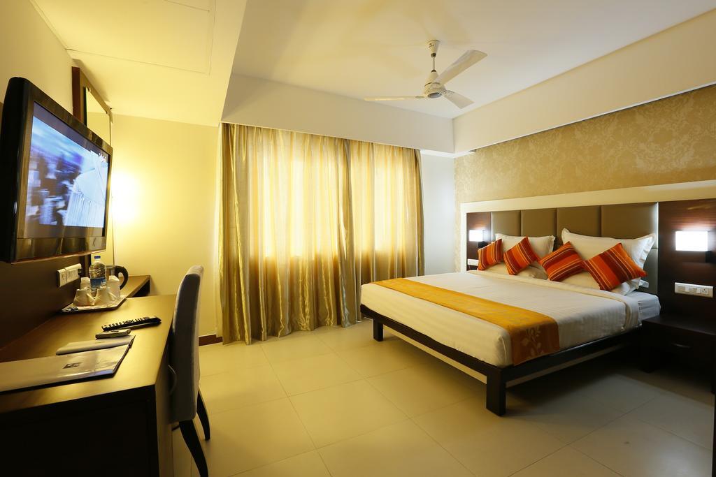 Hotel Moonlit Regency Thodupuzha Oda fotoğraf