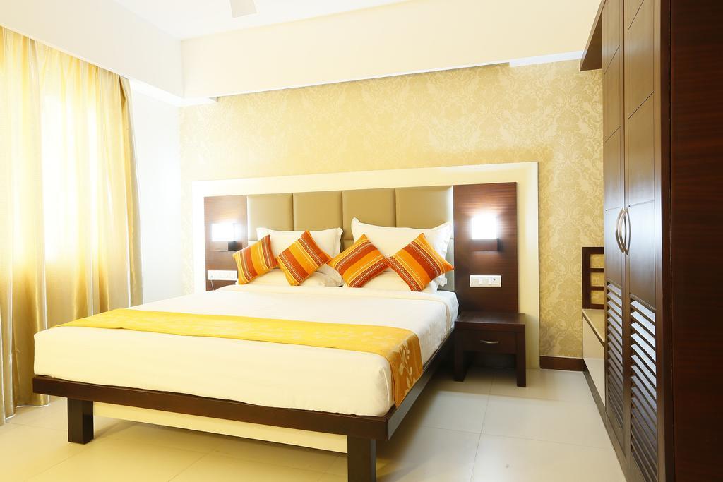 Hotel Moonlit Regency Thodupuzha Oda fotoğraf